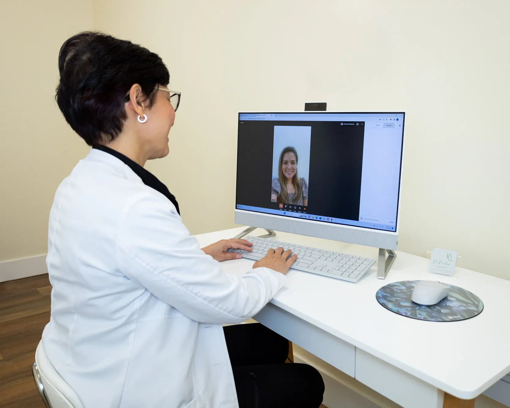 Dr. Lisette Portes providing virtual care from her Miami office